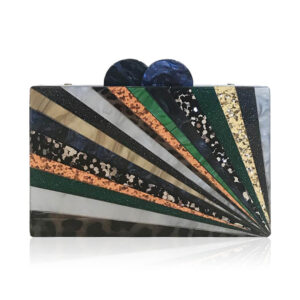 Fall in Love With Starburst With This Clutch Purse. This Clutch Purse is an Array of Neutral Tones and Patterns. Elizabeth Sutton.